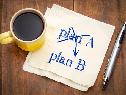 Handwritten note showing “Plan A” crossed out and replaced with “Plan B,” representing adapting financial plans when life changes.